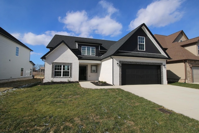 view of front of house with brick siding, a front lawn, board and batten siding, and concrete driveway