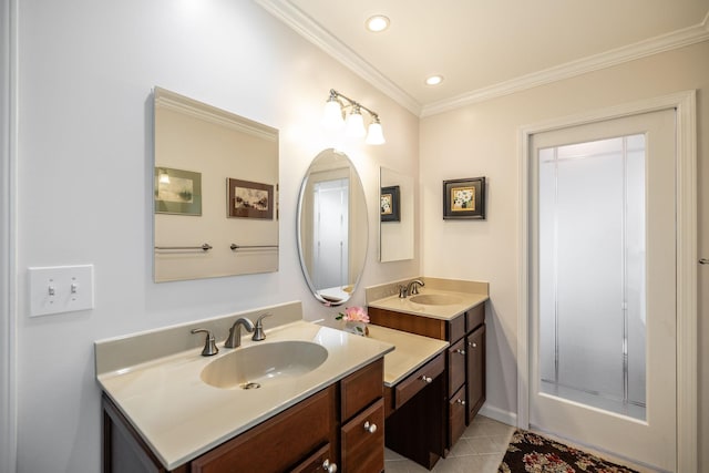bathroom featuring crown molding, vanity, baseboards, tile patterned floors, and recessed lighting