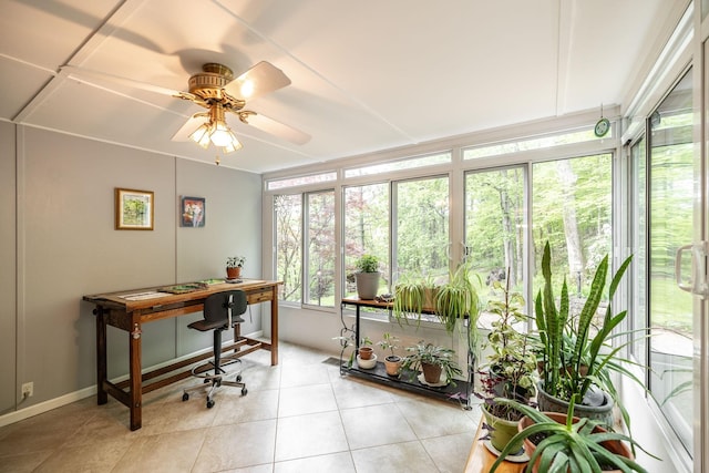 office area featuring baseboards, a ceiling fan, and light tile patterned floors
