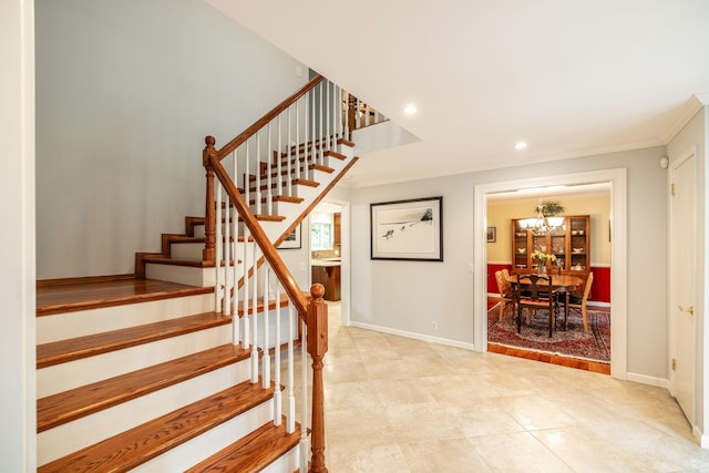 stairway with tile patterned flooring, baseboards, a chandelier, ornamental molding, and recessed lighting