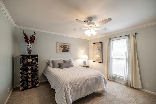 bedroom with carpet floors, ornamental molding, baseboards, and ceiling fan