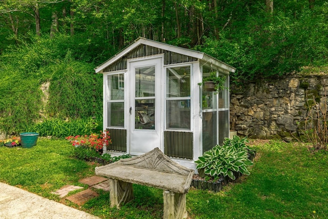 view of outbuilding with an outbuilding