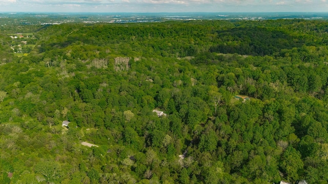 aerial view featuring a view of trees