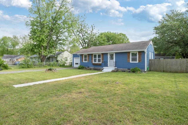 view of front of home with crawl space, fence, driveway, and a front yard