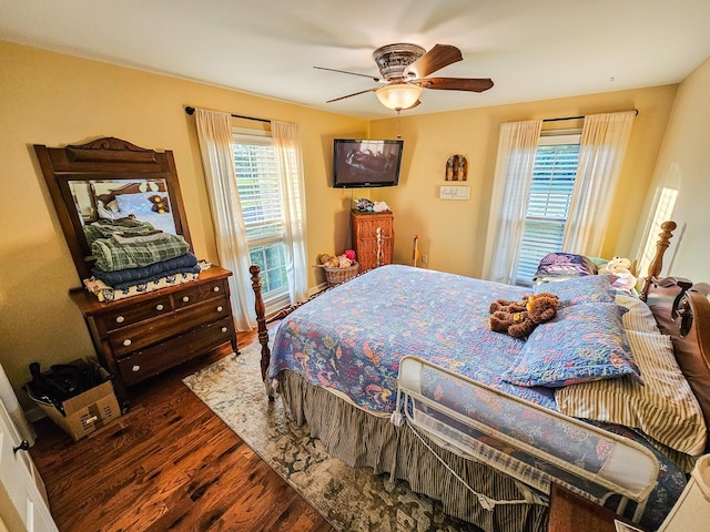 bedroom with ceiling fan and wood finished floors
