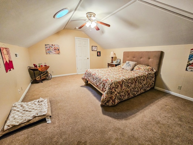 bedroom featuring baseboards, carpet flooring, ceiling fan, and vaulted ceiling