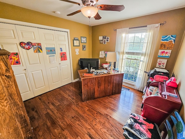 home office featuring a ceiling fan and wood finished floors