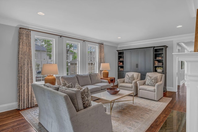 living room with baseboards, ornamental molding, and dark wood-type flooring
