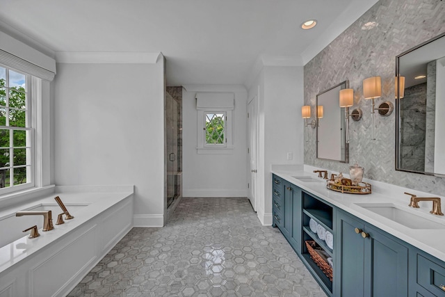 bathroom with baseboards, a sink, a bath, and a stall shower