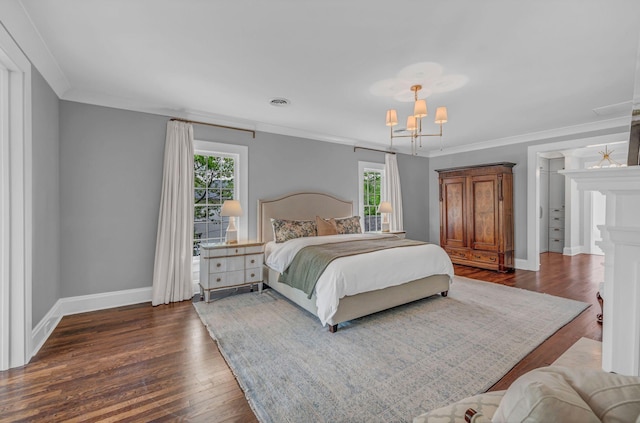 bedroom featuring an inviting chandelier, baseboards, and ornamental molding