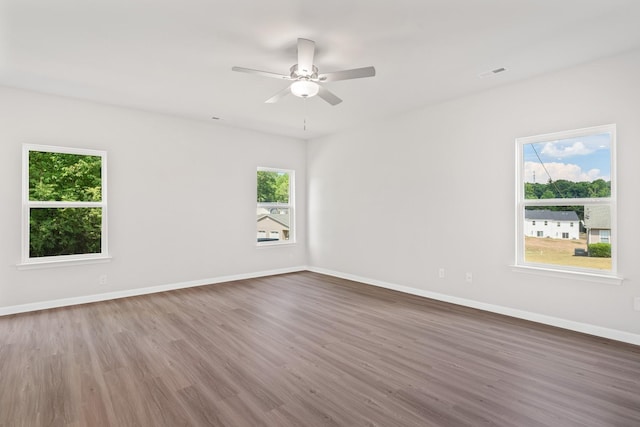 2020 Lala Loop, White Bluff, TN 37187 - unfurnished room with baseboards, a ceiling fan, wood finished floors, and visible vents