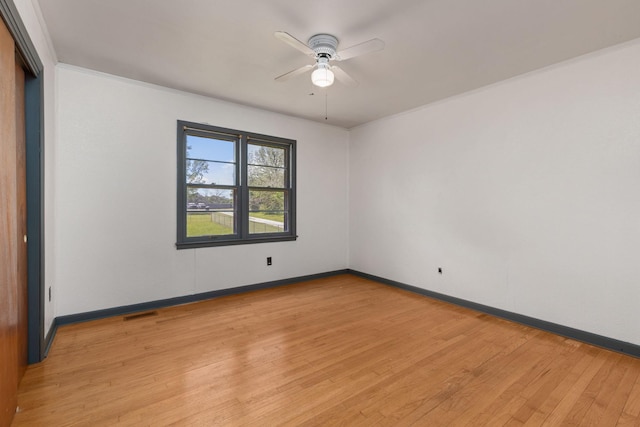 1759 Summertown Hwy, Hohenwald, TN 38462 - unfurnished room with baseboards, ceiling fan, visible vents, and light wood-style flooring