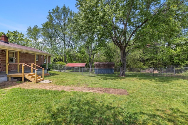 1759 Summertown Hwy, Hohenwald, TN 38462 - view of yard featuring a fenced backyard and a deck