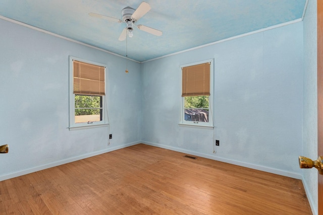 1759 Summertown Hwy, Hohenwald, TN 38462 - unfurnished room with baseboards, ceiling fan, light wood-style flooring, and visible vents