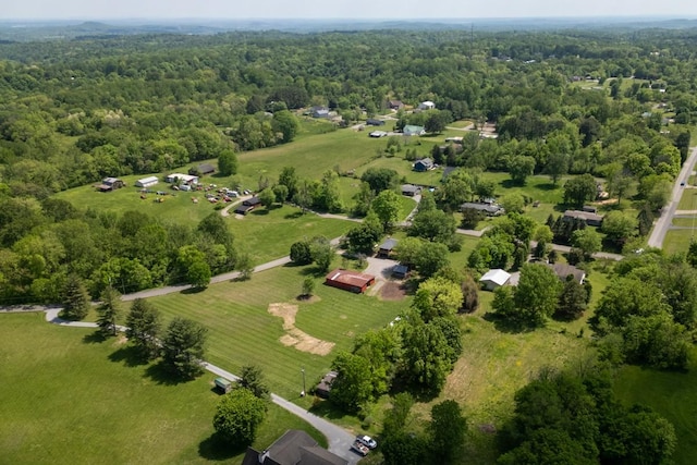 aerial view with a wooded view