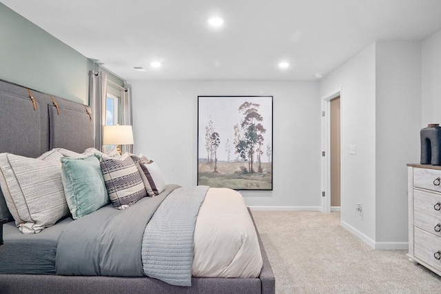 bedroom featuring recessed lighting, baseboards, and light carpet
