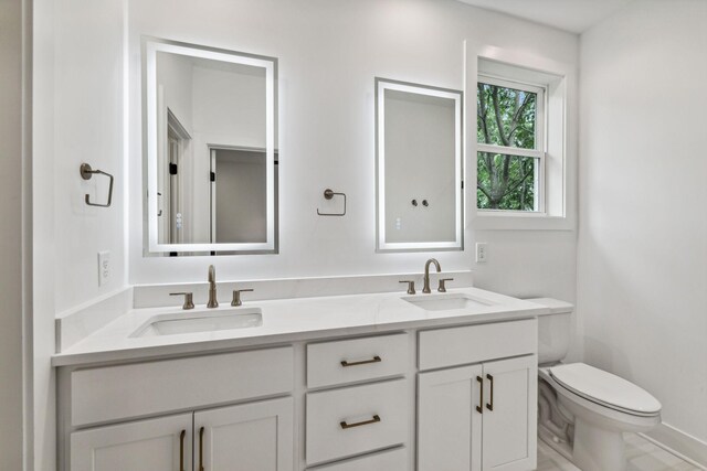 1303 Katie Ave Unit B, Nashville, TN 37207 - bathroom with a sink, toilet, and double vanity