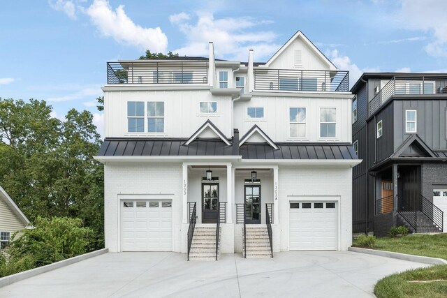 1303 Katie Ave Unit B, Nashville, TN 37207 - townhome / multi-family property featuring a garage, a balcony, and brick siding