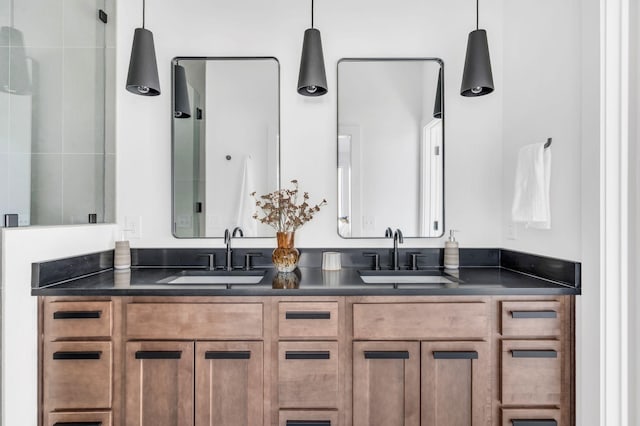 full bathroom featuring double vanity and a sink
