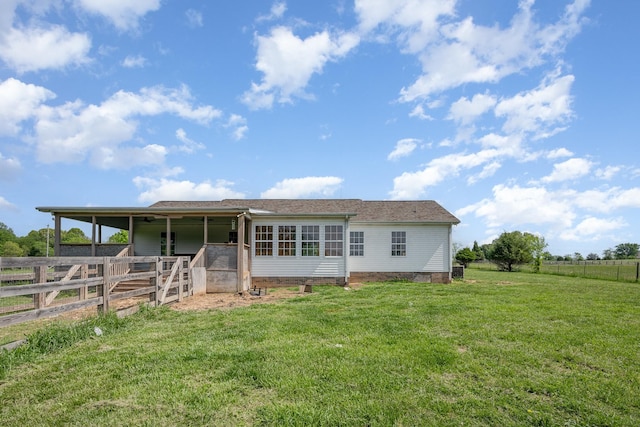 view of front of home featuring an exterior structure and an outbuilding