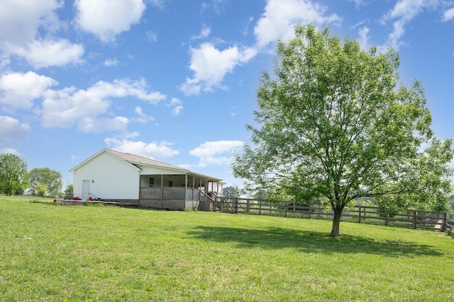 view of yard featuring fence