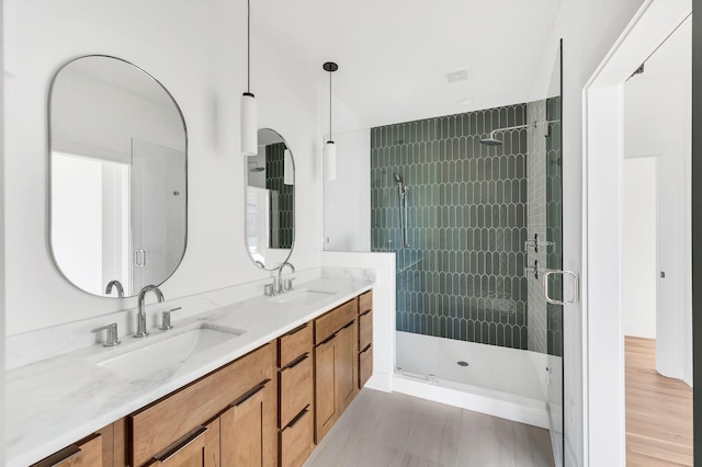 18 Willis St Unit C, Nashville, TN 37207 - bathroom with double vanity, a sink, and a stall shower