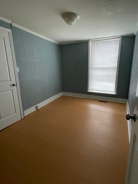 1309 Arlington Ave, Chattanooga, TN 37406 - spare room featuring ornamental molding and wood finished floors