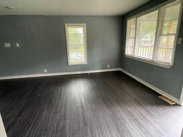 1309 Arlington Ave, Chattanooga, TN 37406 - spare room with dark wood-style flooring and baseboards