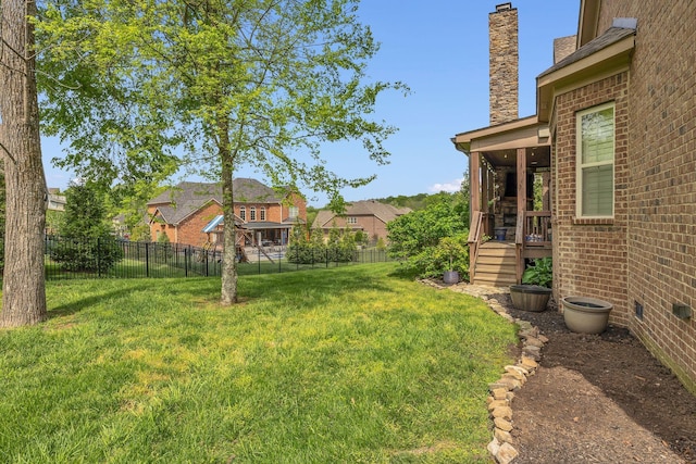 view of yard with stairway and fence