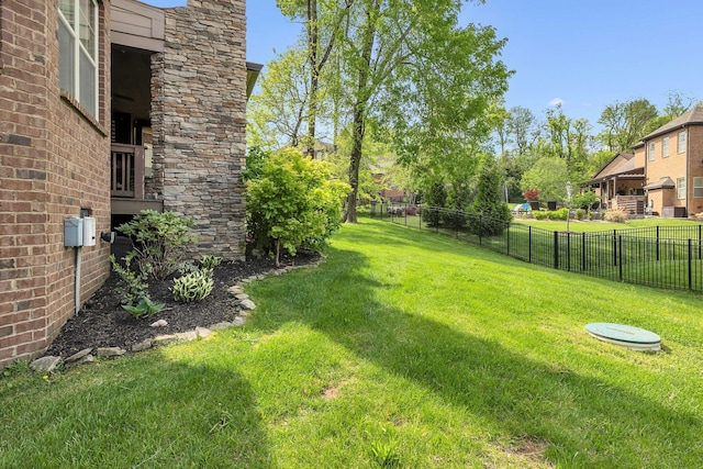 view of yard featuring fence