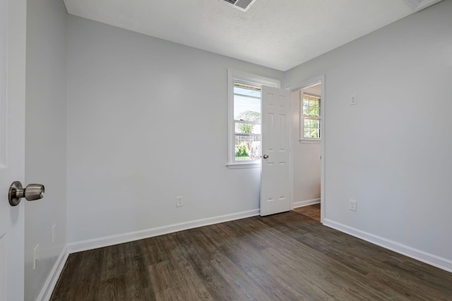 217 Sterry Ct, Antioch, TN 37013 - empty room featuring baseboards and dark wood-style floors