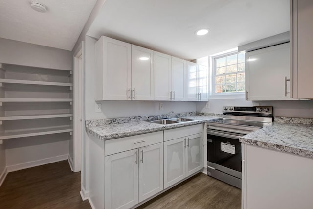 217 Sterry Ct, Antioch, TN 37013 - kitchen with white cabinets, electric range, dark wood finished floors, and a sink