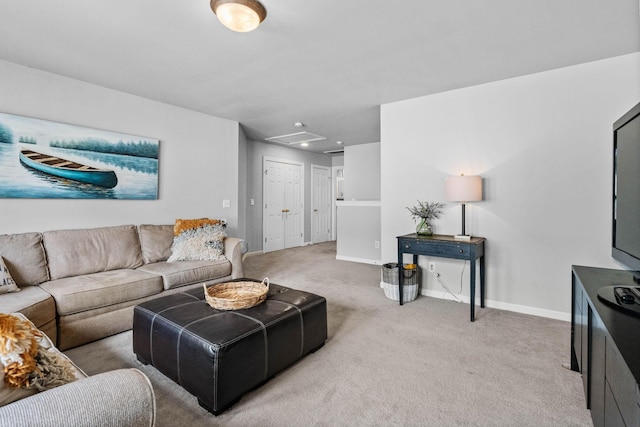 carpeted living area with recessed lighting, baseboards, and attic access