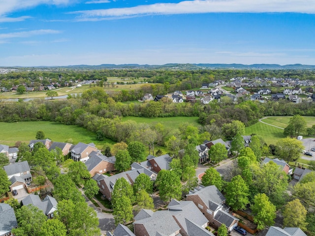 birds eye view of property with a residential view and a mountain view