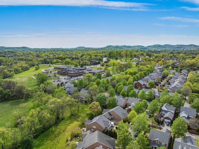 drone / aerial view featuring a residential view and a mountain view