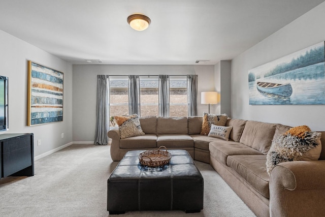 living area with baseboards, carpet, and visible vents