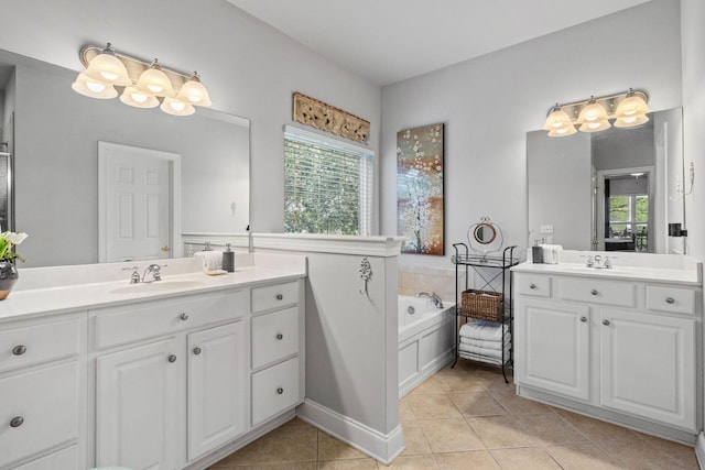 bathroom featuring a sink, tile patterned flooring, and a healthy amount of sunlight