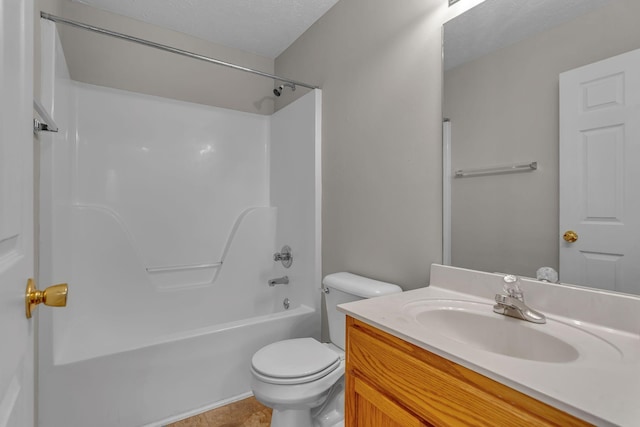 full bathroom with vanity, tile patterned flooring, washtub / shower combination, and toilet