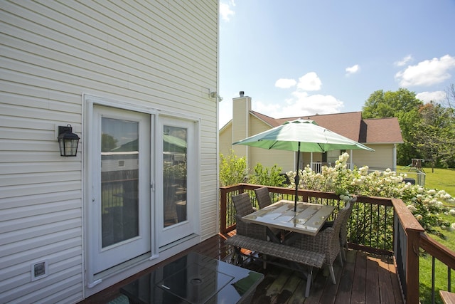 deck featuring outdoor dining space