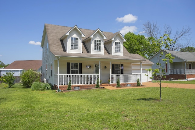 cape cod-style house featuring an attached garage, a porch, and a front lawn
