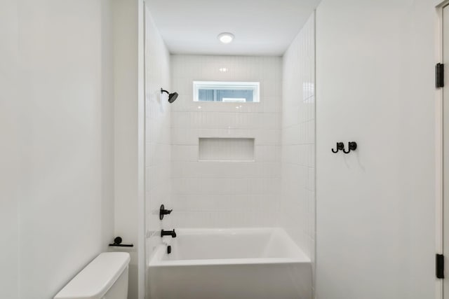 full bathroom featuring toilet and shower / tub combination