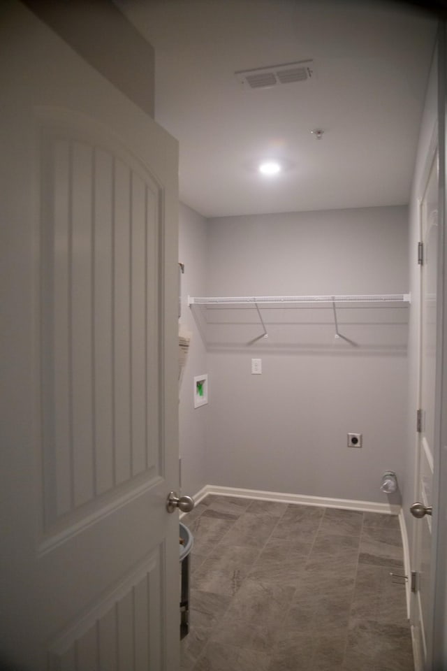 319 Mattie Ln, Spring Hill, TN 37174 - clothes washing area featuring laundry area, washer hookup, dark floors, baseboards, and visible vents