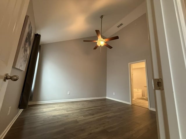319 Mattie Ln, Spring Hill, TN 37174 - unfurnished bedroom featuring baseboards, dark wood-style flooring, and high vaulted ceiling