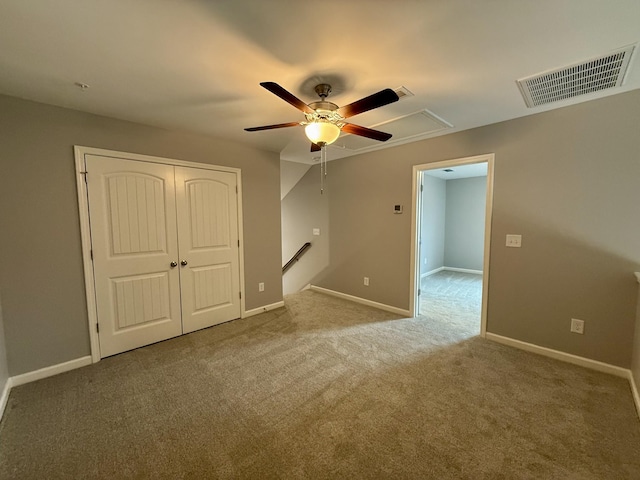 319 Mattie Ln, Spring Hill, TN 37174 - empty room with a ceiling fan, attic access, visible vents, baseboards, and carpet