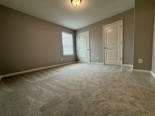 319 Mattie Ln, Spring Hill, TN 37174 - unfurnished bedroom with baseboards and carpet floors