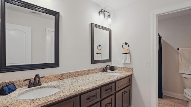 1210 Macey Peri Way, Smyrna, TN 37167 - full bathroom with toilet, double vanity, baseboards, and tile patterned floors