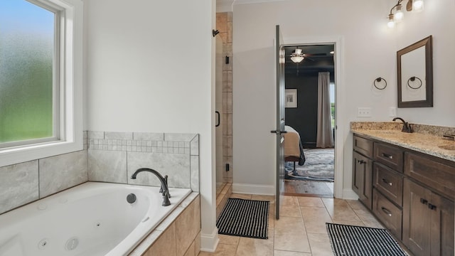 1210 Macey Peri Way, Smyrna, TN 37167 - ensuite bathroom with a tub with jets, double vanity, a stall shower, a ceiling fan, and tile patterned floors