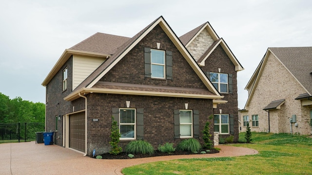 1210 Macey Peri Way, Smyrna, TN 37167 - view of front of property featuring driveway, a garage, brick siding, and central AC
