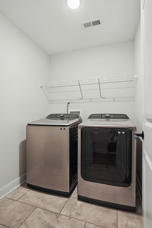1210 Macey Peri Way, Smyrna, TN 37167 - washroom featuring washer and clothes dryer and baseboards