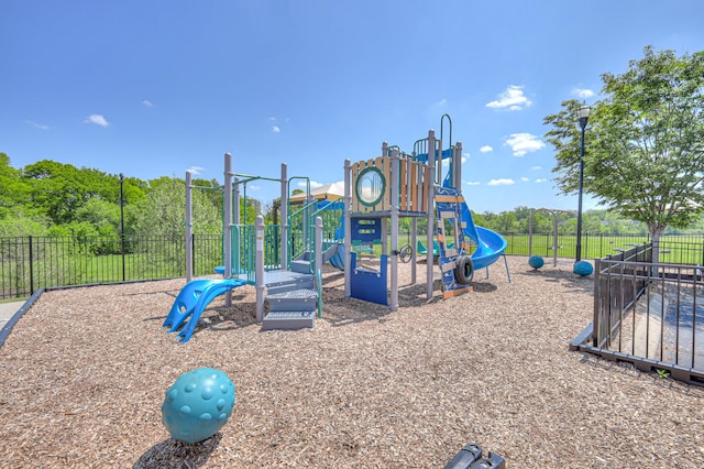 community playground featuring fence